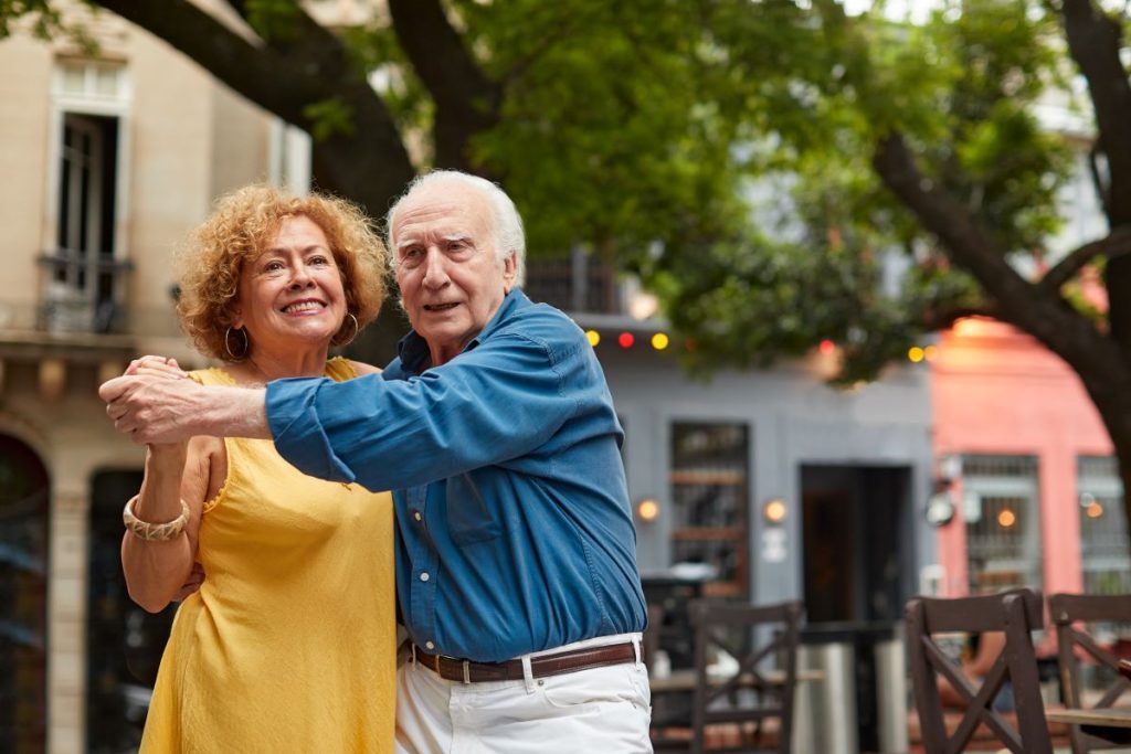 Seniors dancing outside